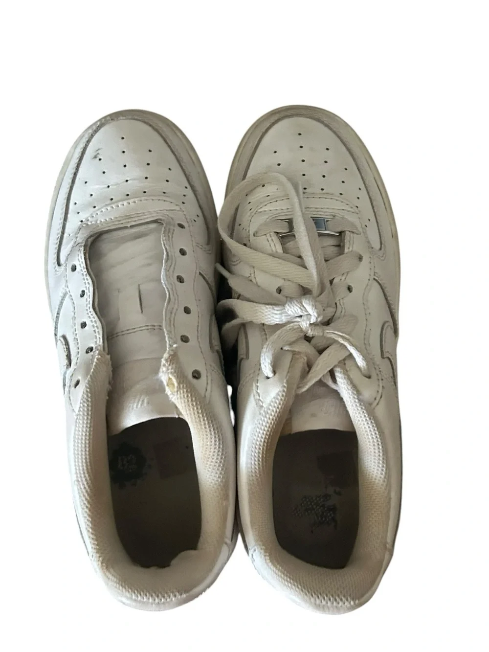 Nike Kids White Low-Top Sneakers with Subtle Off-White Tones